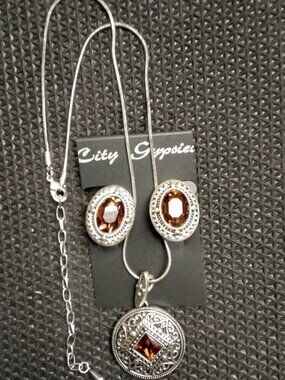 Silvertone necklace and clip-on earrings